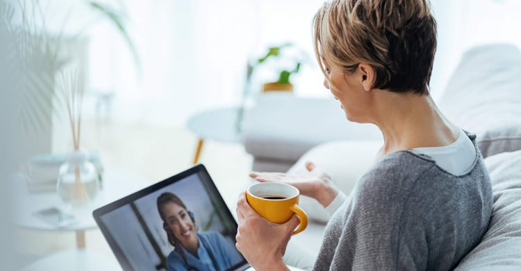 Women looking at tablet during telehealth appointment