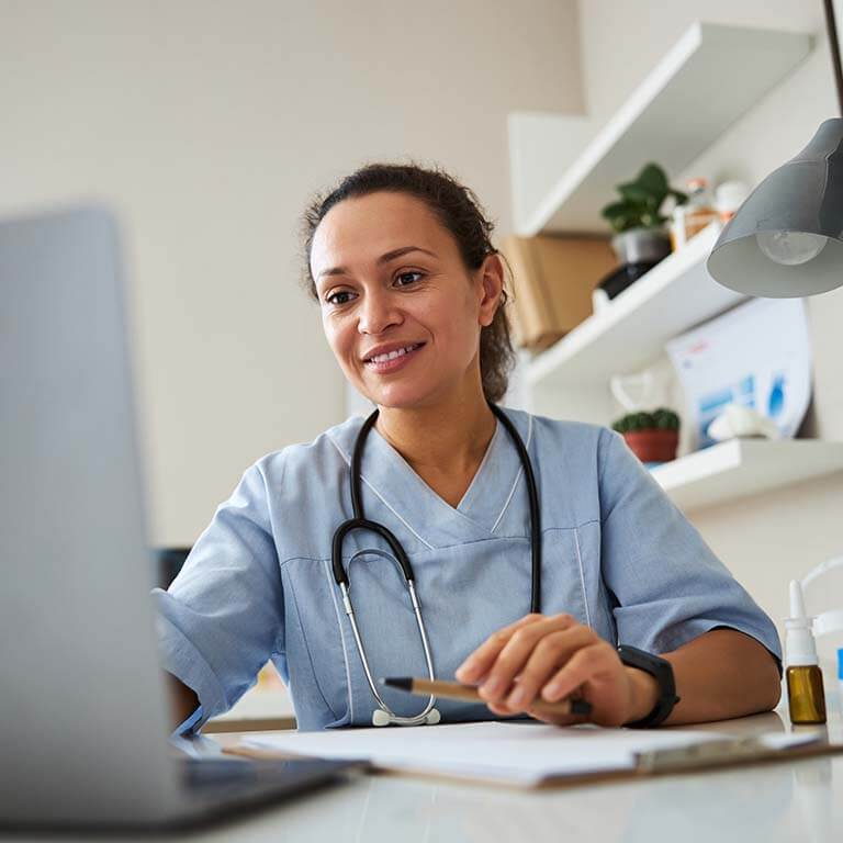 doctor working on computer