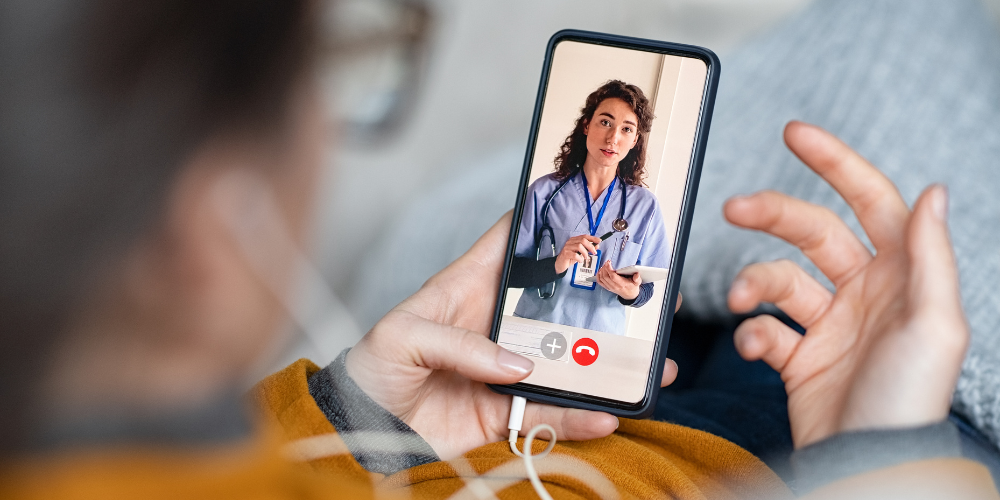 Woman doing video call with doctor